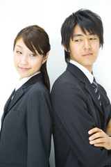 man and woman back to back