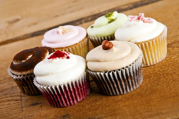cupcakes on wooden background