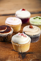 cupcakes on wooden background