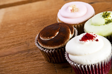 cupcakes on wooden background