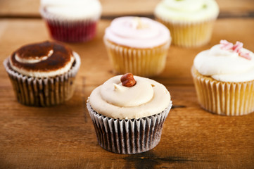 cupcakes on wooden background