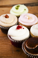 mixed tartlets on a wooden table