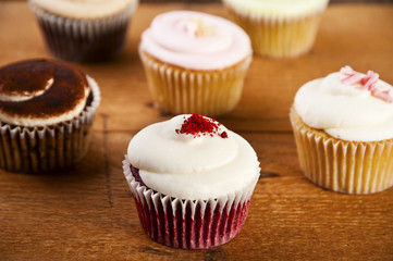 cupcakes on wooden background