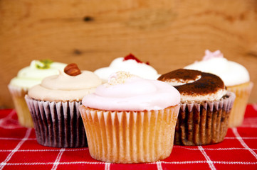 cupcakes on wooden background