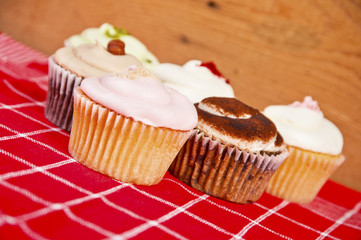 cupcakes on wooden background