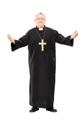 Mature reverend in black mantle with open hands