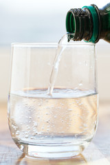 spring water pouring into glass