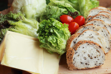 bread sprinkled with sesame -  vegetable green salad