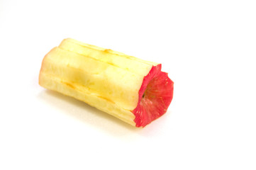 Red apple core on a white background
