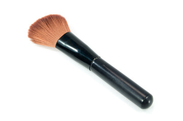 A makeup brush on white background