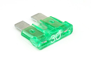 30-Amp blade fuse (green) on white