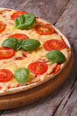 Neapolitan pizza margarita closeup. Vertical