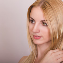 Studio portrait of a beautiful young blonde woman