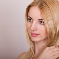 Obraz premium Studio portrait of a beautiful young blonde woman