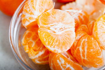 ripe tangerines on  plate