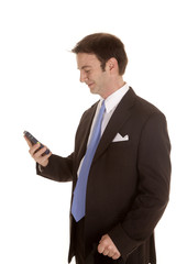 Man in suit side look at phone
