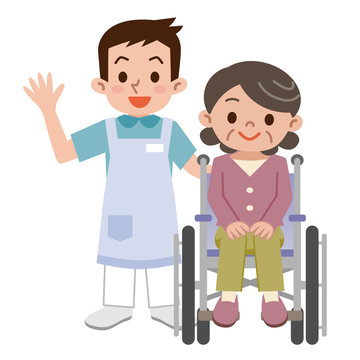 介護士と車椅子のシニア女性
