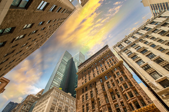 Manhattan, New York. Skyward view of city skyscrapers - Powered by Adobe