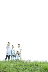 smiling family holding hands