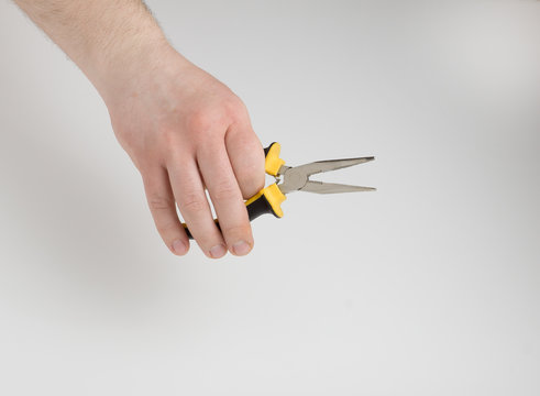 pliers and hands