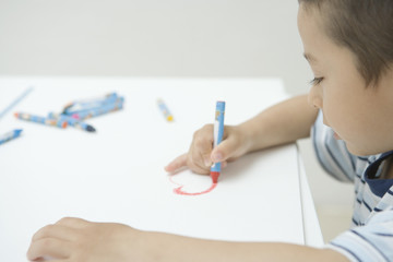 boy drawing a picture