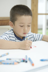 boy drawing a picture