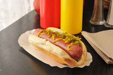 Hot dog with mustard and relish