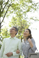 Naklejka premium smiling senior husband and wife