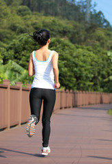 fitness woman running at park
