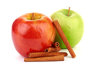 Red and green apples, cinnamon sticks