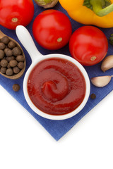 tomato sauce in bowl on white