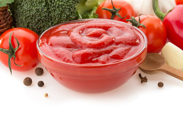 tomato sauce in bowl on white