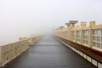 Foggy weather. Pier in Blankenberge, Belgium.