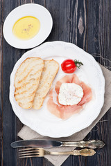 Prosciutto ham poached egg