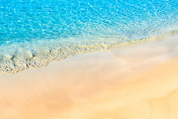Fototapeta na wymiar sandy beach and turquoise crystal clear water