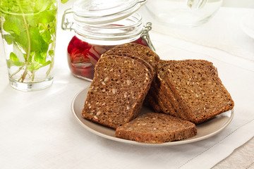 Brown bread with mint and plum compote