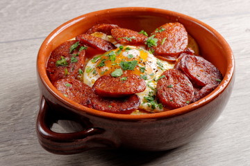 Spanish tapas with potatoes, iberian ham, chorizo sausage,egg