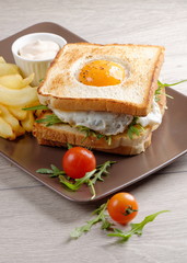 Fresh triple decker premium club sandwich with french fries