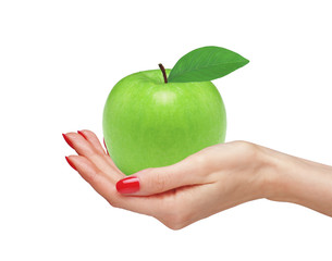 Big green apple in woman hand isolated on white