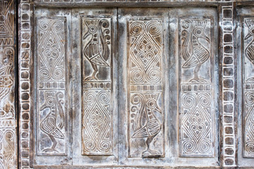 Carved wooden background with asian motives