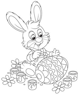 Little Bunny paints an Easter egg
