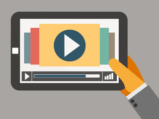 tablet on the hand with video player