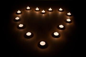 Lit Candles in a Heart Shape