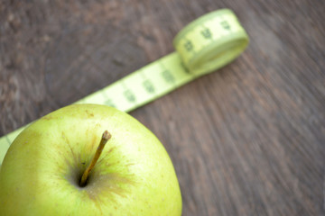 Apple and tape measure