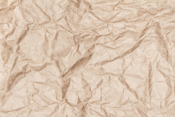 Crumpled recycled paper background texture. Vintage craft paper