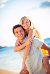 Couple on the beach at sunset