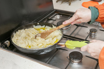 Spanish potato omelet cooking