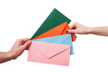 Hands with colourful envelopes © Photographee.eu