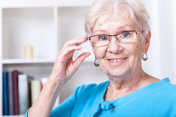 Grandmother wearing reading glasses