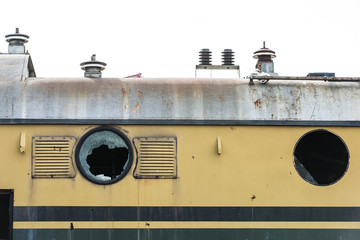 Detail of old locomotive with broken windows